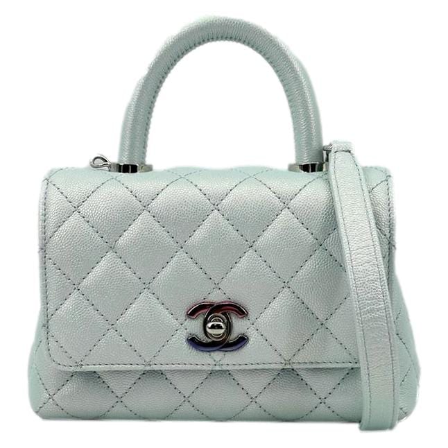 CHANEL Coco Extra Mini Top Handle Iridescent Caviar Leather Crossbody Bag Light Blue