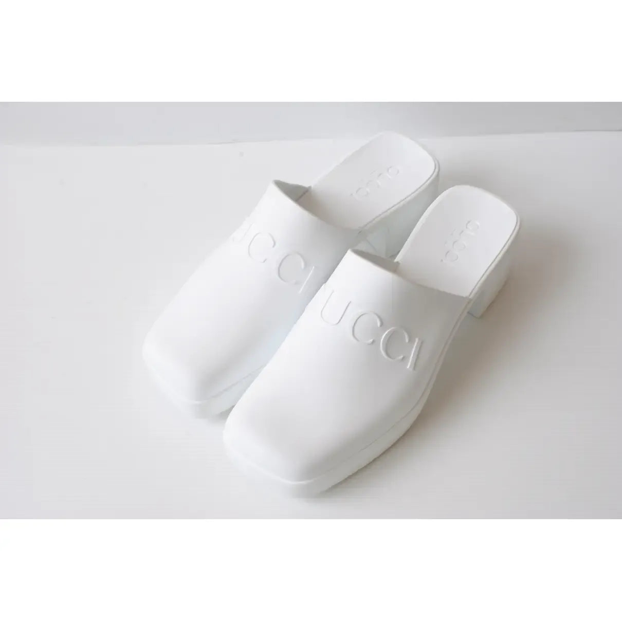 Leather mules & clogs Gucci White