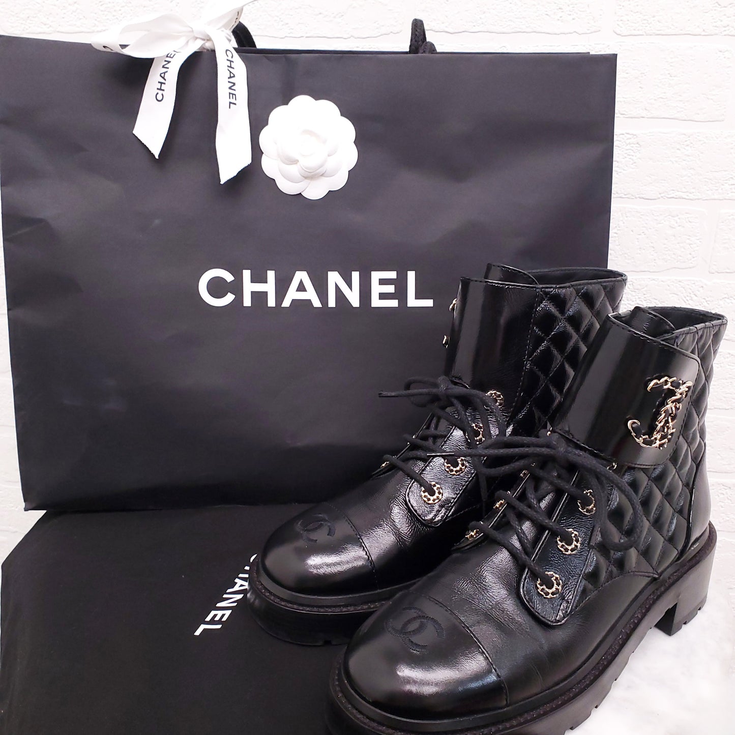 CHANEL 2022 BLACK PATENT QUILTED COMBAT BOOTS - SIZE 40