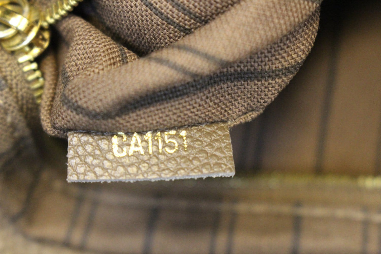 LOUIS VUITTON Artsy MM Empreinte Leather Terre Shoulder Bag