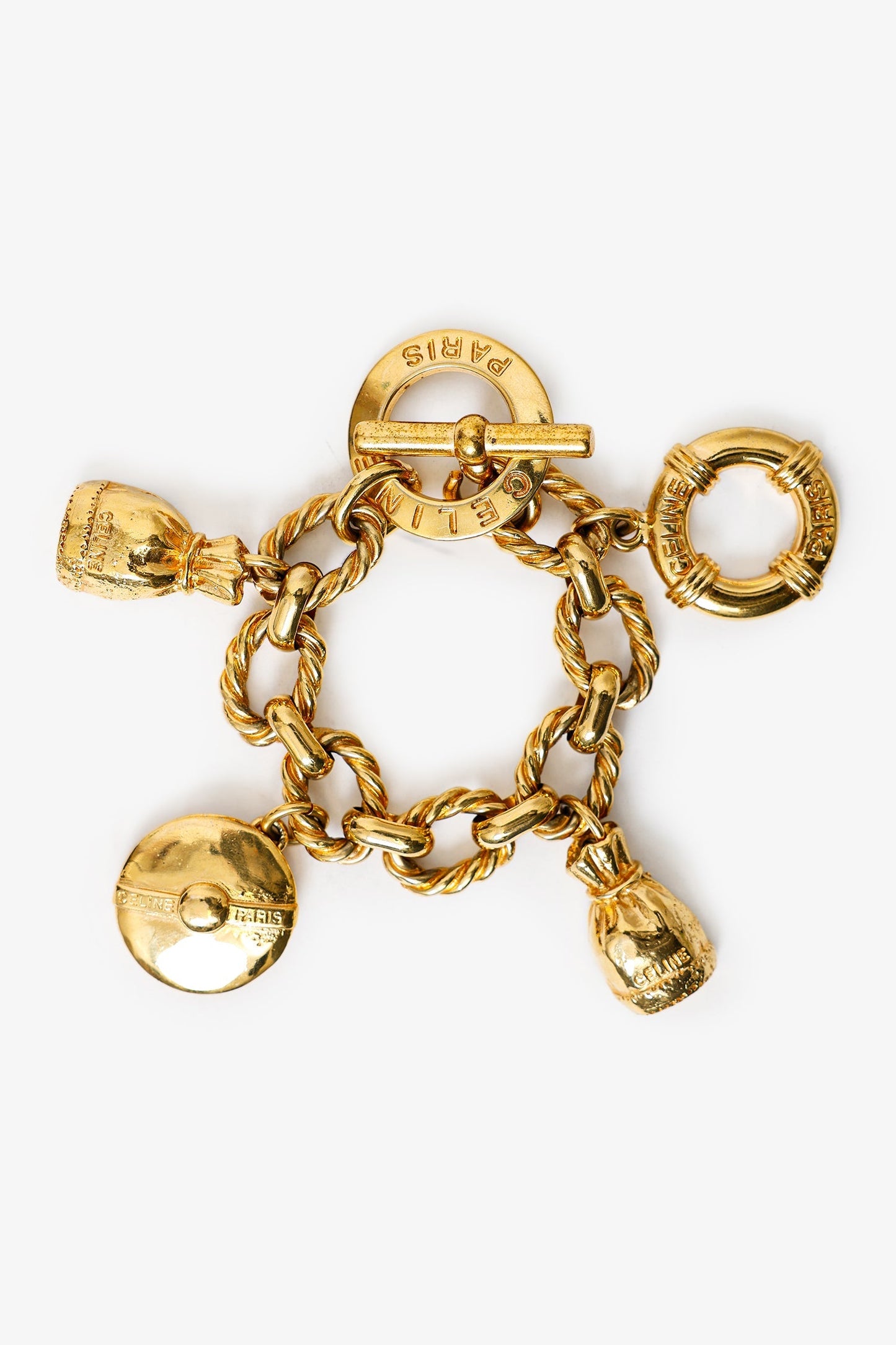 Celine   Gold Toned Charm Toggle Closure Bracelet