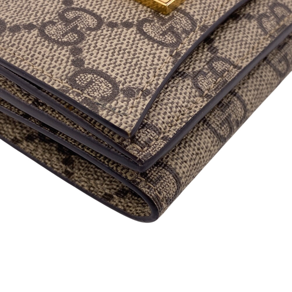 GUCCI Tri-fold wallet 681700 PVC coated canvas beige Balenciaga Compact Wallet GG Supreme logo The Hacker Women