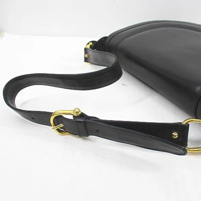 'Cosci' by Gucci black leather two way saddle bag with gold equestrian accents