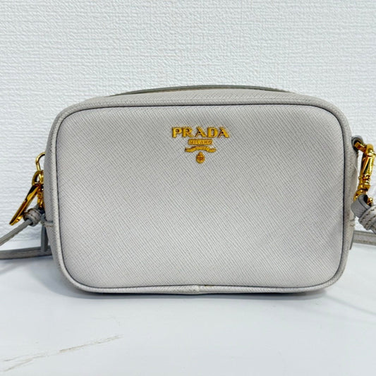 Preloved Prada Saffiano Leather Crossbody FM0045 Beige Crossbody Bag