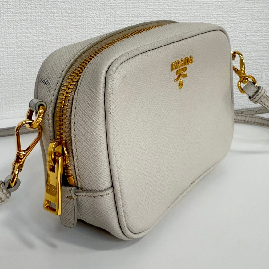Preloved Prada Saffiano Leather Crossbody FM0045 Beige Crossbody Bag