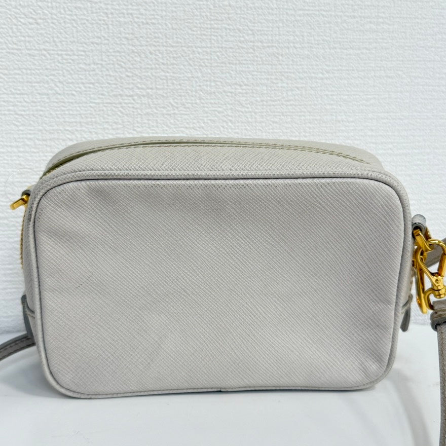 Preloved Prada Saffiano Leather Crossbody FM0045 Beige Crossbody Bag